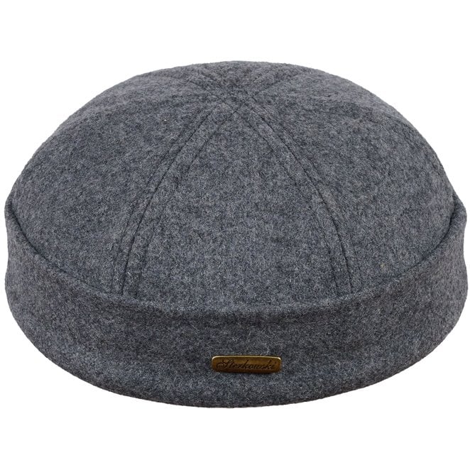 Docker cap sewed with woolen cloth. Warm and breathable.