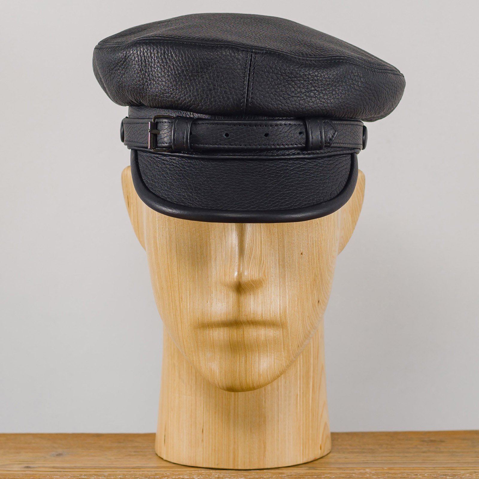 Leather store fiddler cap