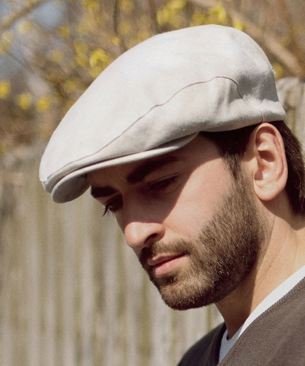 Norte - winter flat cap with foldable earflap made of wool, with padded  cotton lining | Flat Caps